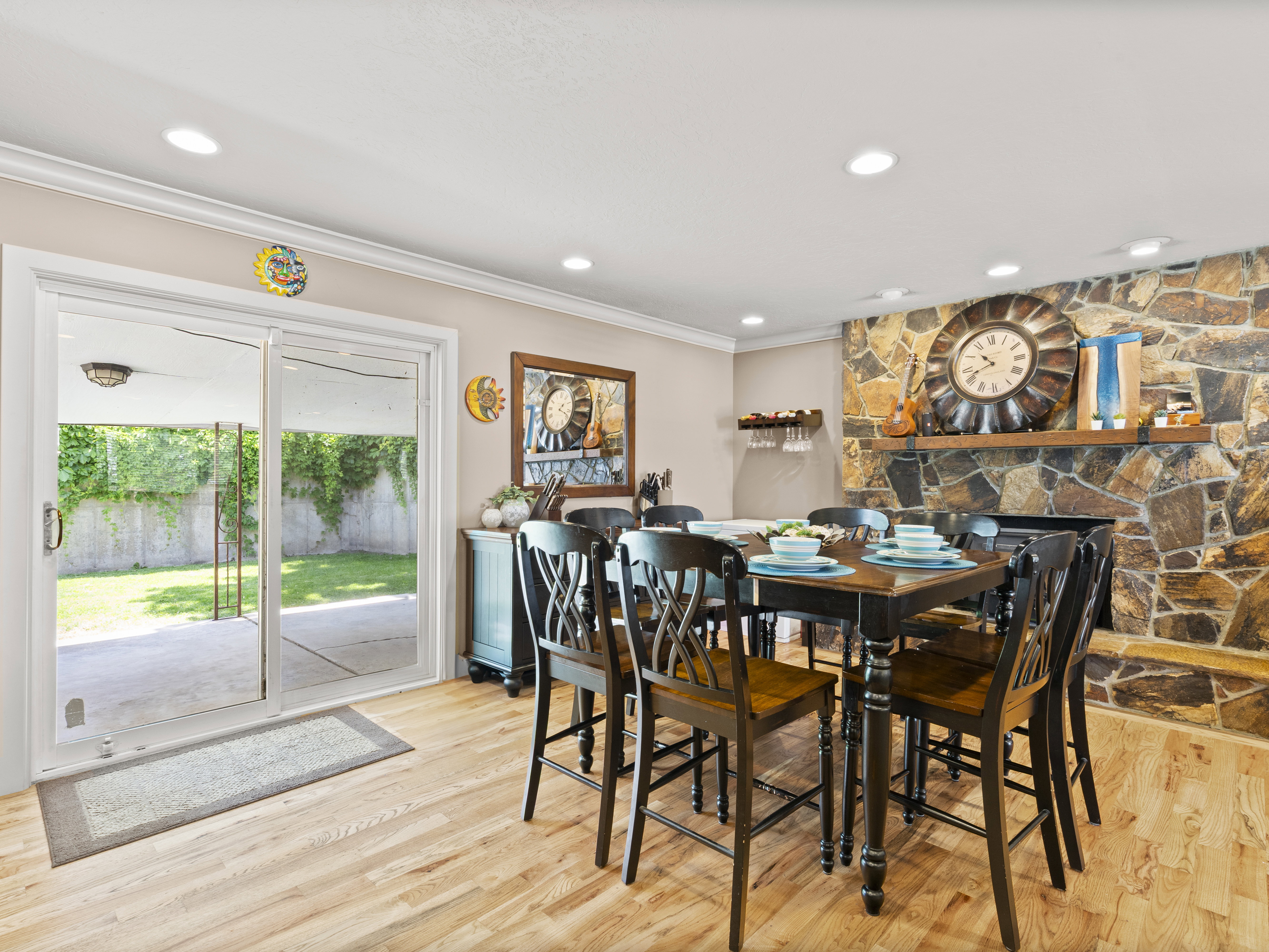 Dining room featuring crown molding, light wood-type flooring, and recessed lighting