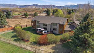 View of subject property with mountains