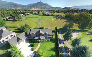 View from above of property with a mountainous background
