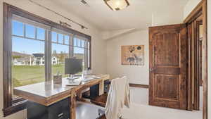 Office with light colored carpet