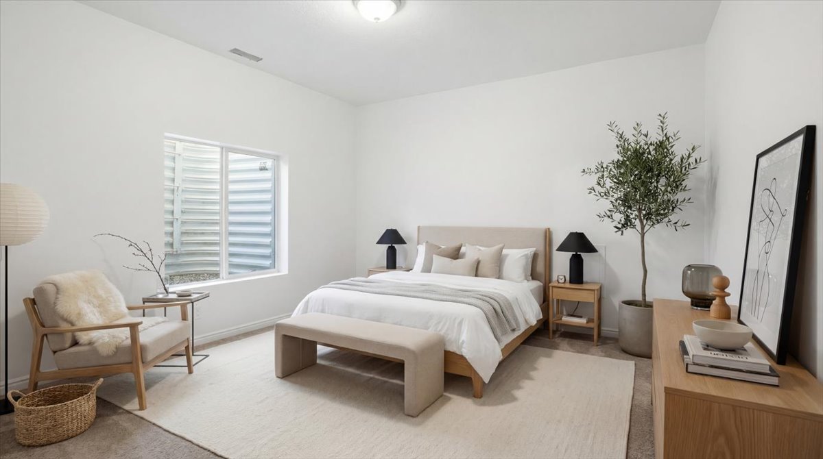 Bedroom featuring baseboards