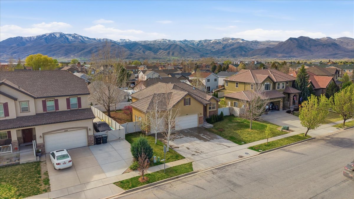 Aerial perspective of suburban area featuring mountains