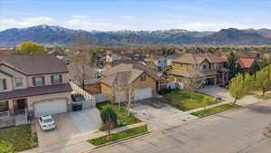 Aerial perspective of suburban area featuring mountains