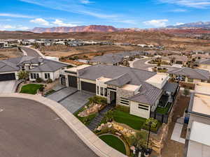 Aerial view of residential area featuring a mountain backdrop