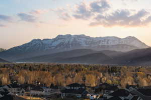 View of mountain background featuring nearby suburban area