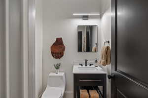 Bathroom with toilet and vanity