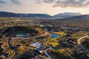 Aerial view at dusk of a water and mountain view