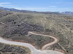 Aerial view of sparsely populated area featuring a mountain backdrop