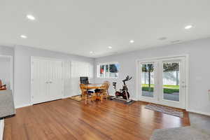 Dining area featuring light wood-style floors and recessed lighting