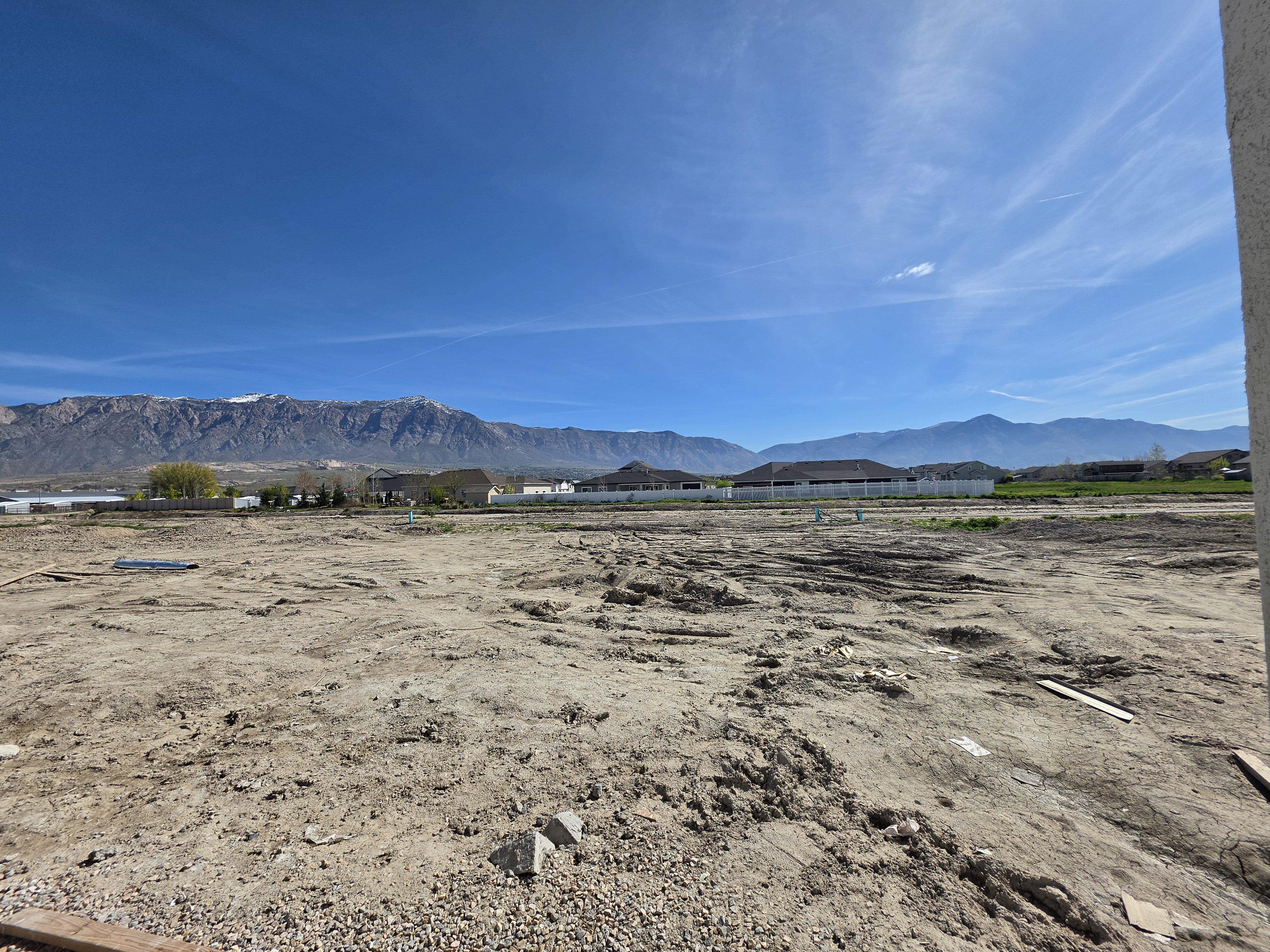 Expansive undeveloped lot with mountain backdrop