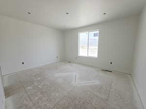 Spare room with baseboards