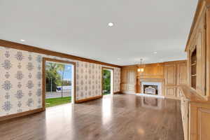 Gorgeous formal living room with beautiful hard wood and lots of natural light