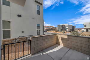 Balcony featuring a residential view