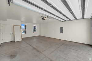 Garage featuring electric panel