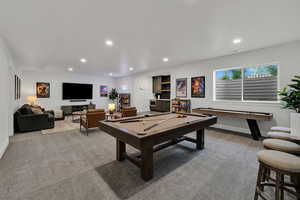 Recreation room with light carpet, recessed lighting, and billiards