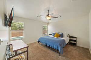 Bedroom featuring carpet floors and ceiling fan