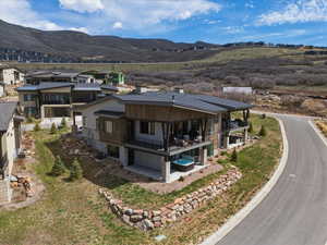 View from above of property with a mountainous background