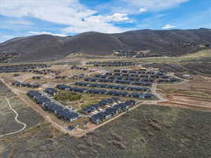 Aerial view of residential area with mountains