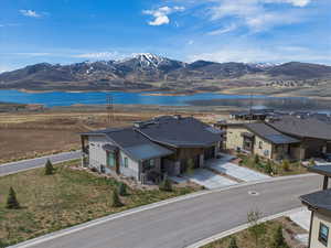Mountain view featuring a nearby body of water