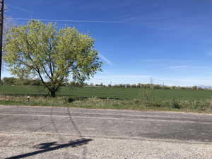 View of asphalt street with a view of countryside