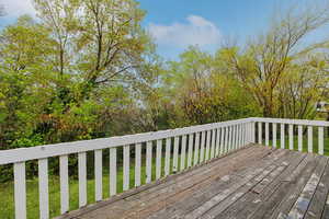 Wooden deck with a lawn