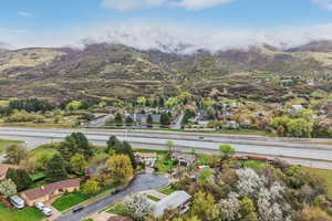 Aerial view of residential area featuring mountains