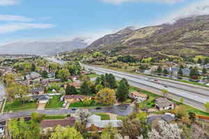 Aerial view of residential area with a mountain backdrop