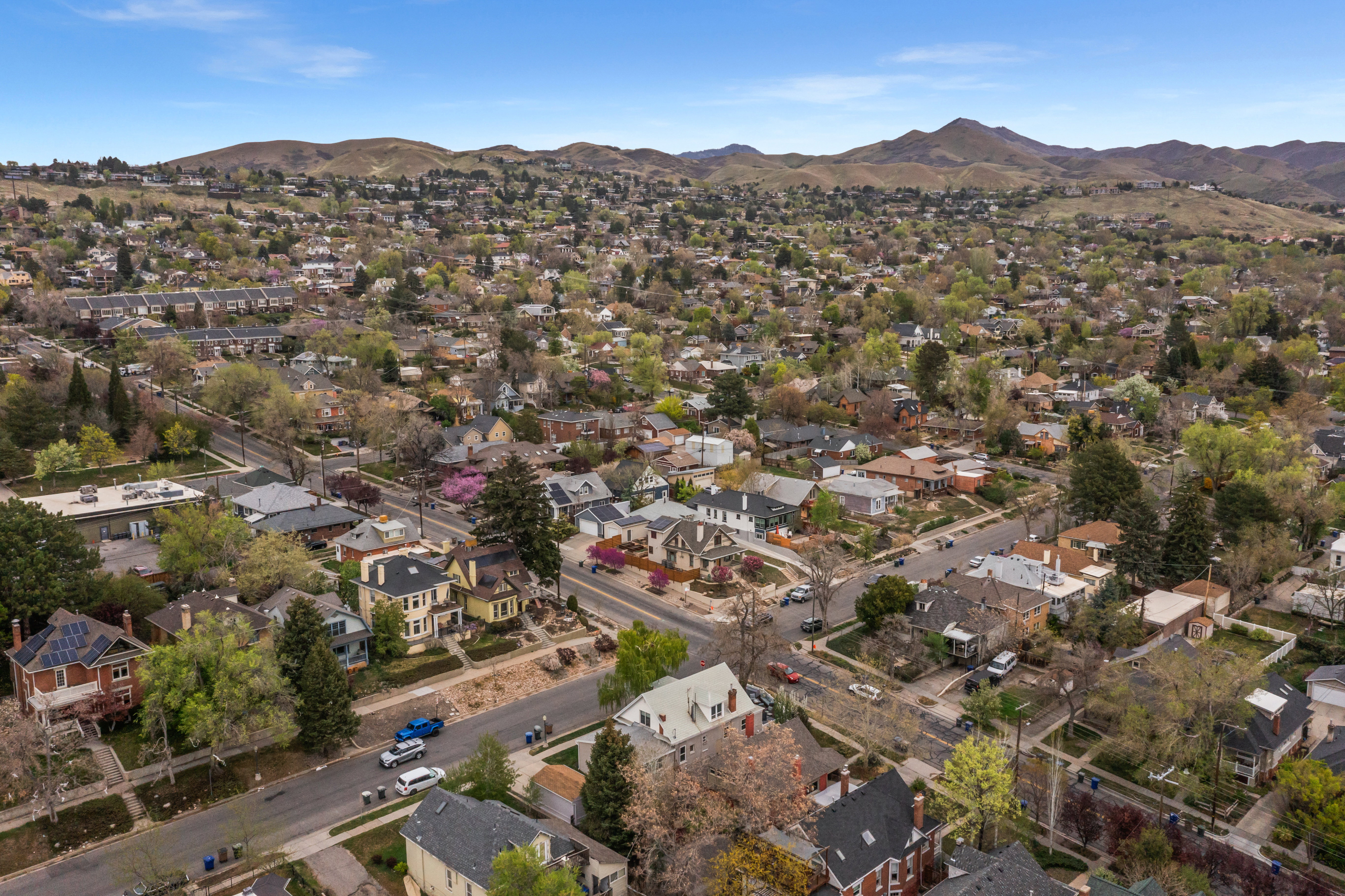 Aerial view of residential area with a mountain backdrop