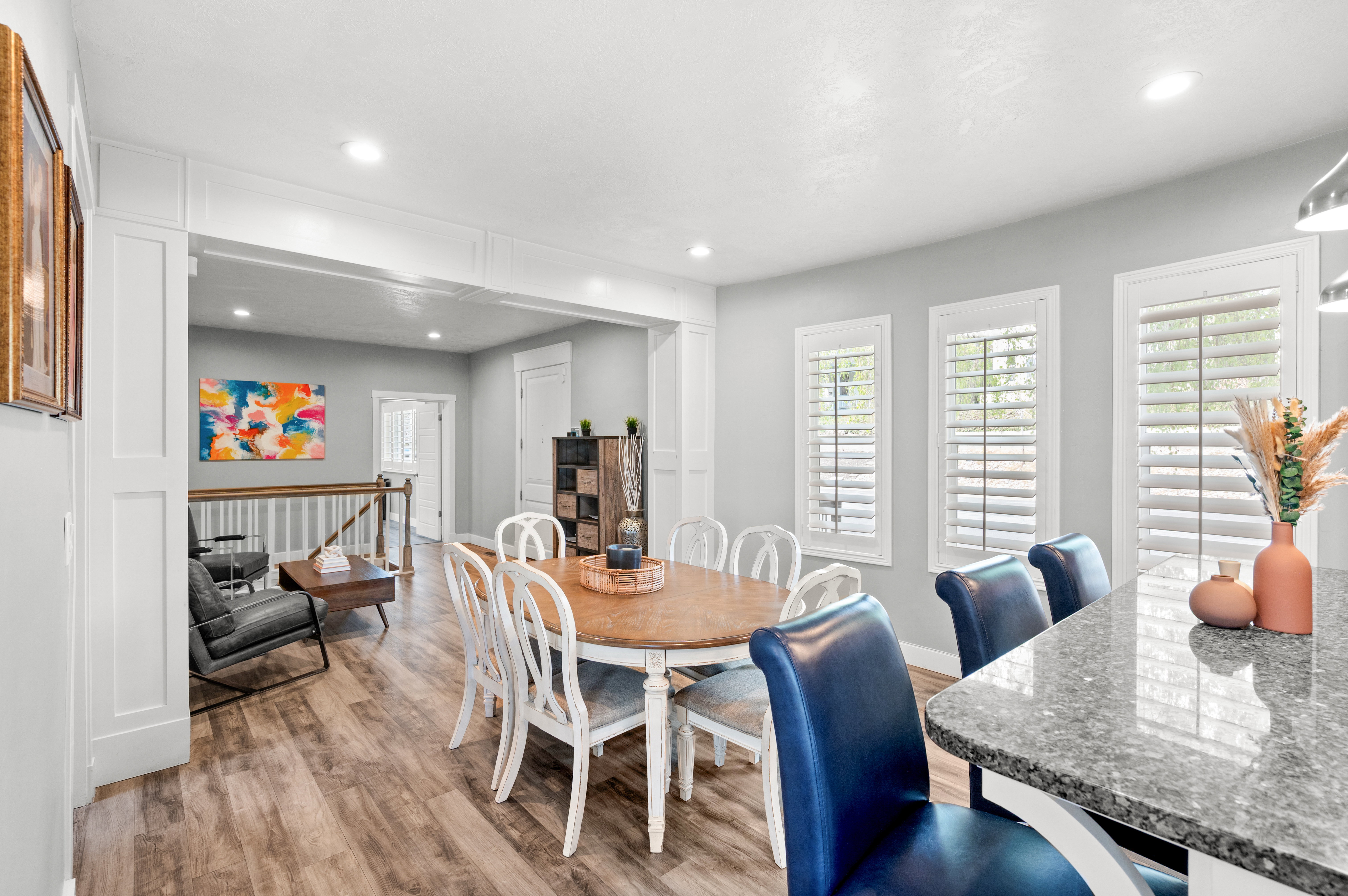 Dining room featuring light wood-style flooring and recessed lighting