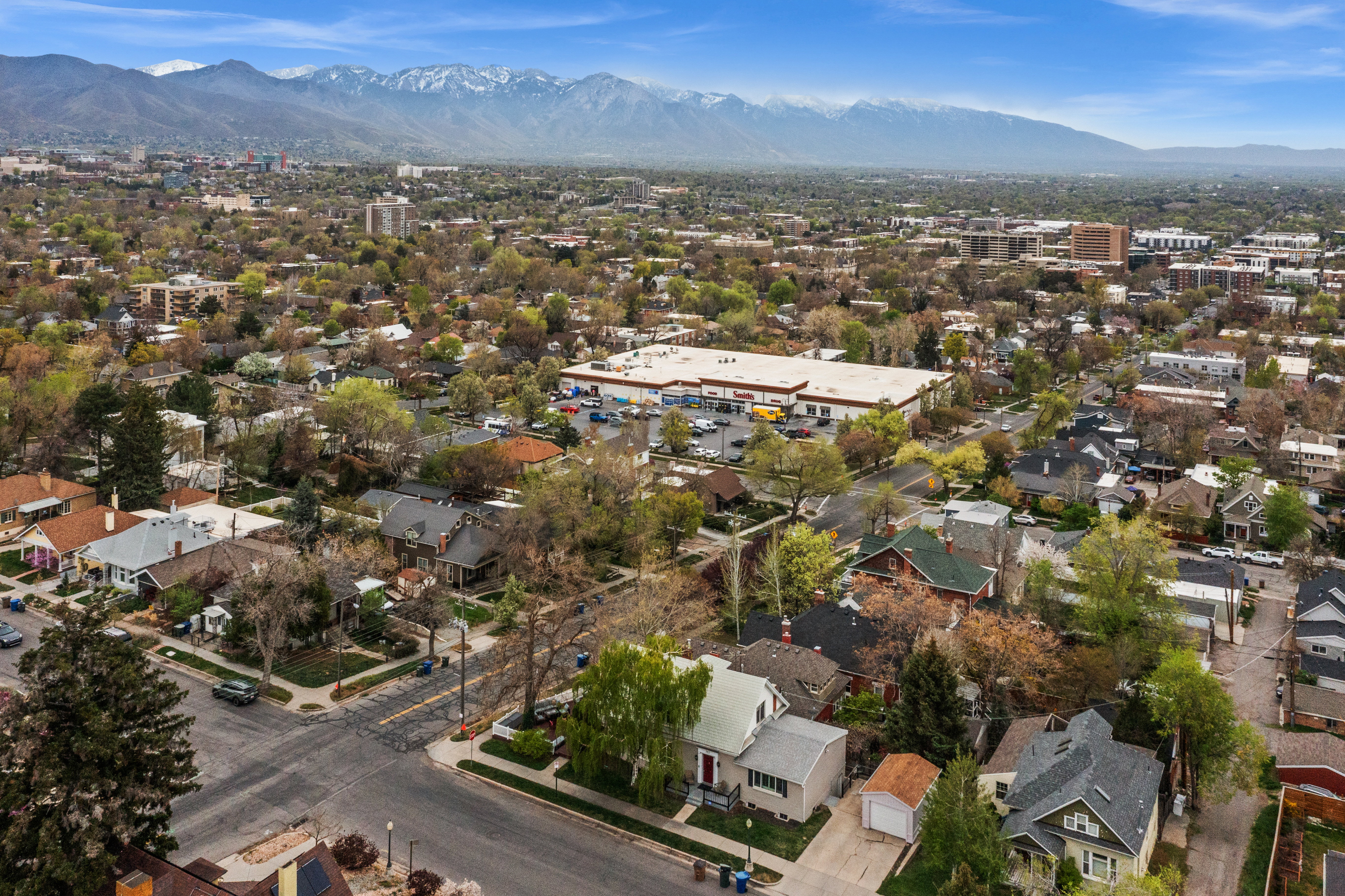 View of property location with mountains and nearby suburban area