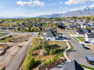 Aerial view of residential area featuring mountains