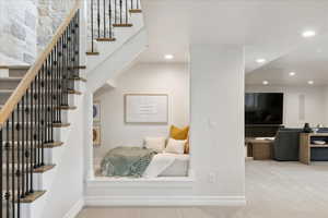 Stairs featuring carpet floors and recessed lighting