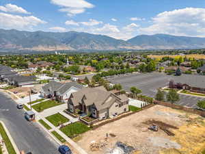 Aerial view of residential area featuring mountains