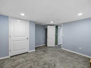 Unfurnished bedroom featuring recessed lighting