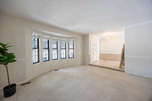 Formal living room perfect for a piano or reading room.