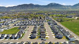 View of property location with nearby suburban area and mountains
