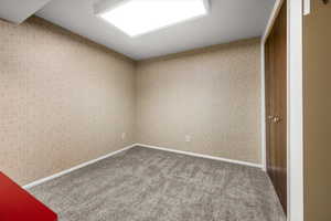 Spare room with carpet flooring