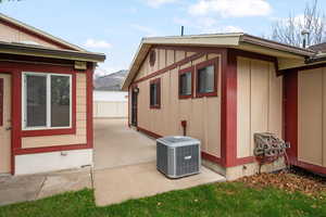 View of home's exterior featuring board and batten siding and a mountain view