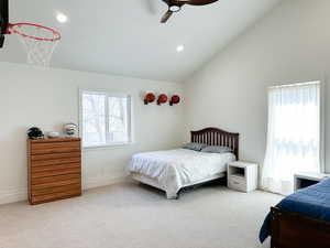 Bedroom featuring light carpet, recessed lighting, ceiling fan, and vaulted ceiling