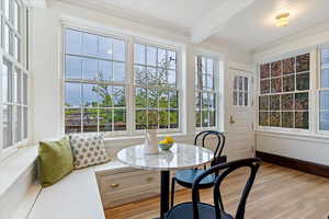 Sunroom with beamed ceiling