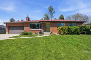 Brick exterior with a red roof