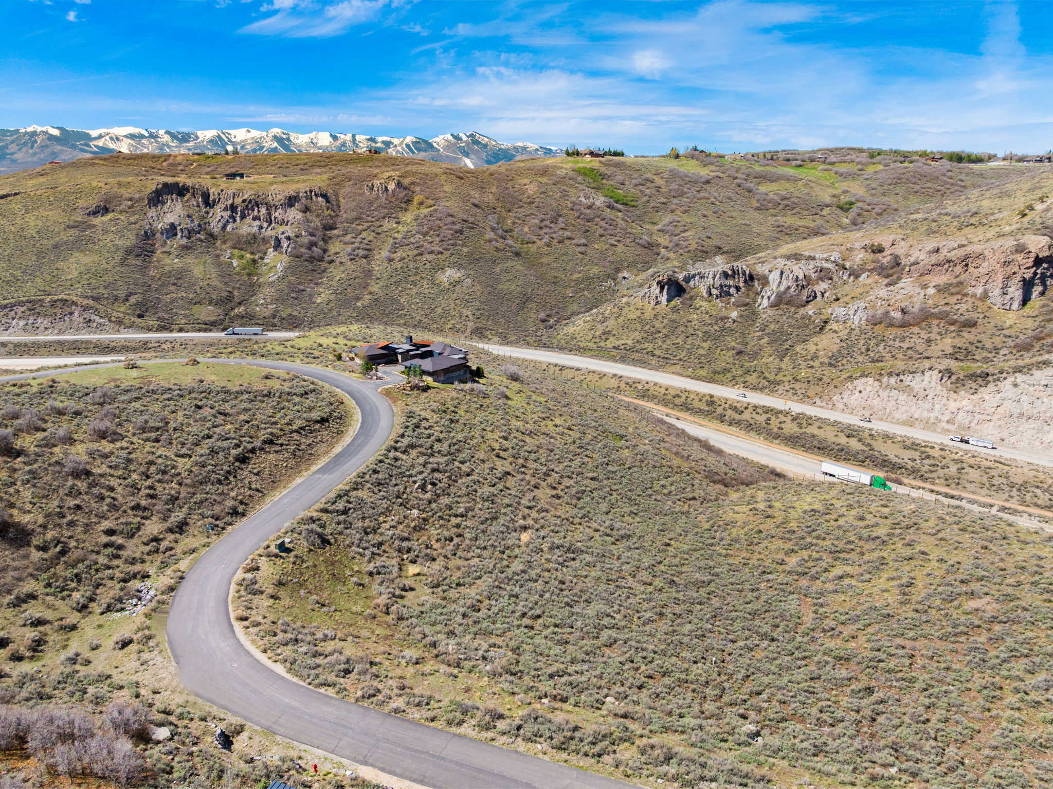 Drone / aerial view of a mountainous background