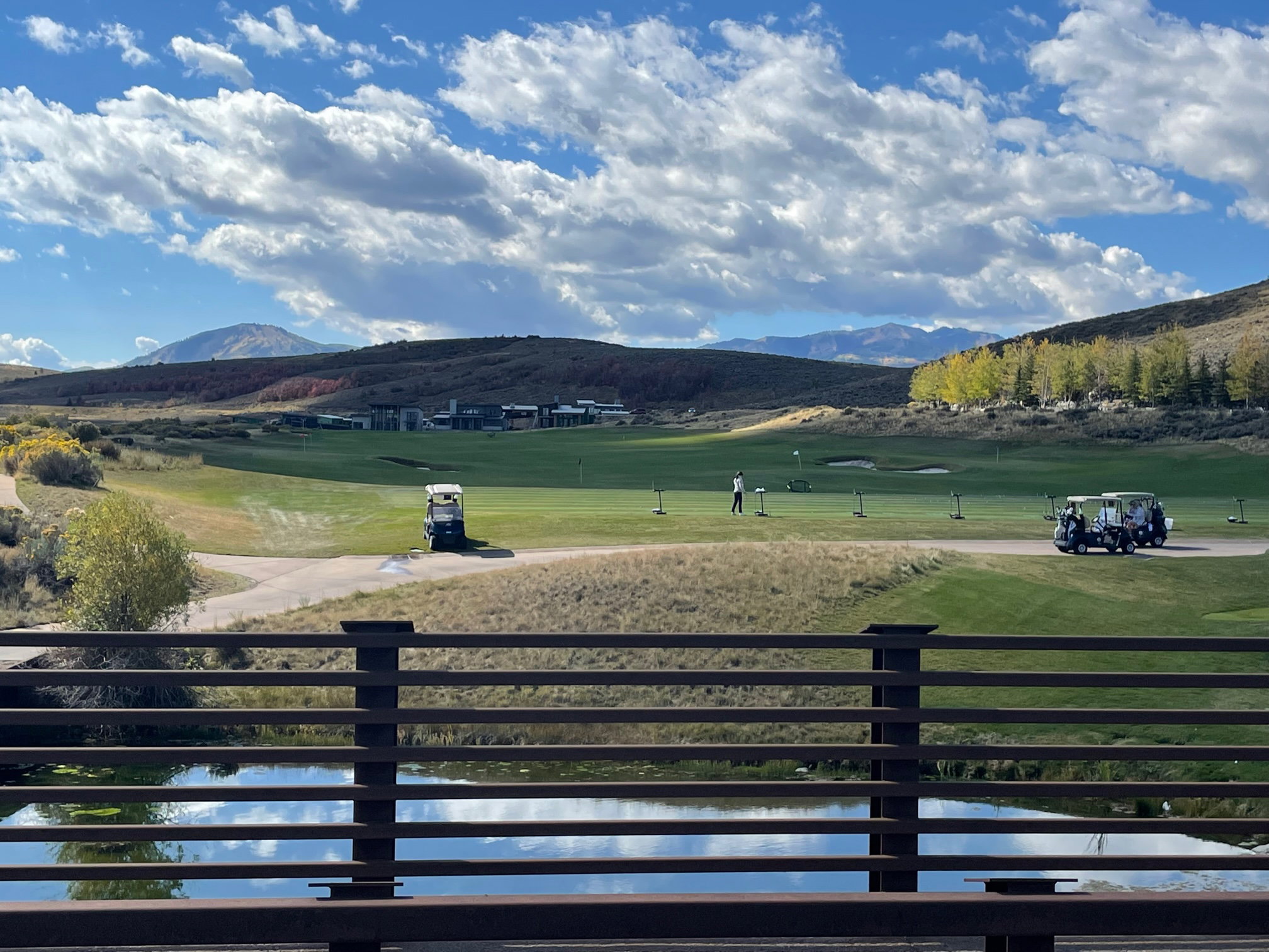 View of mountain background featuring a golf club