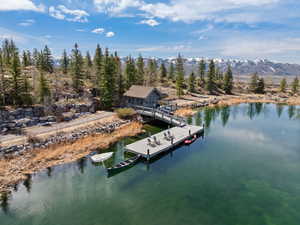 Dock with a water and mountain view