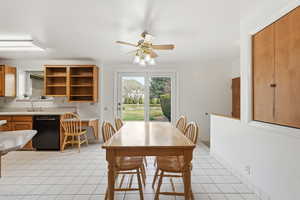 Dining area with light tile patterned floors and ceiling fan