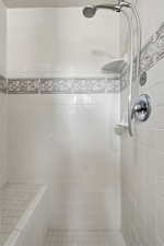 Bathroom with a tile shower