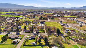 Aerial view of residential area featuring mountains