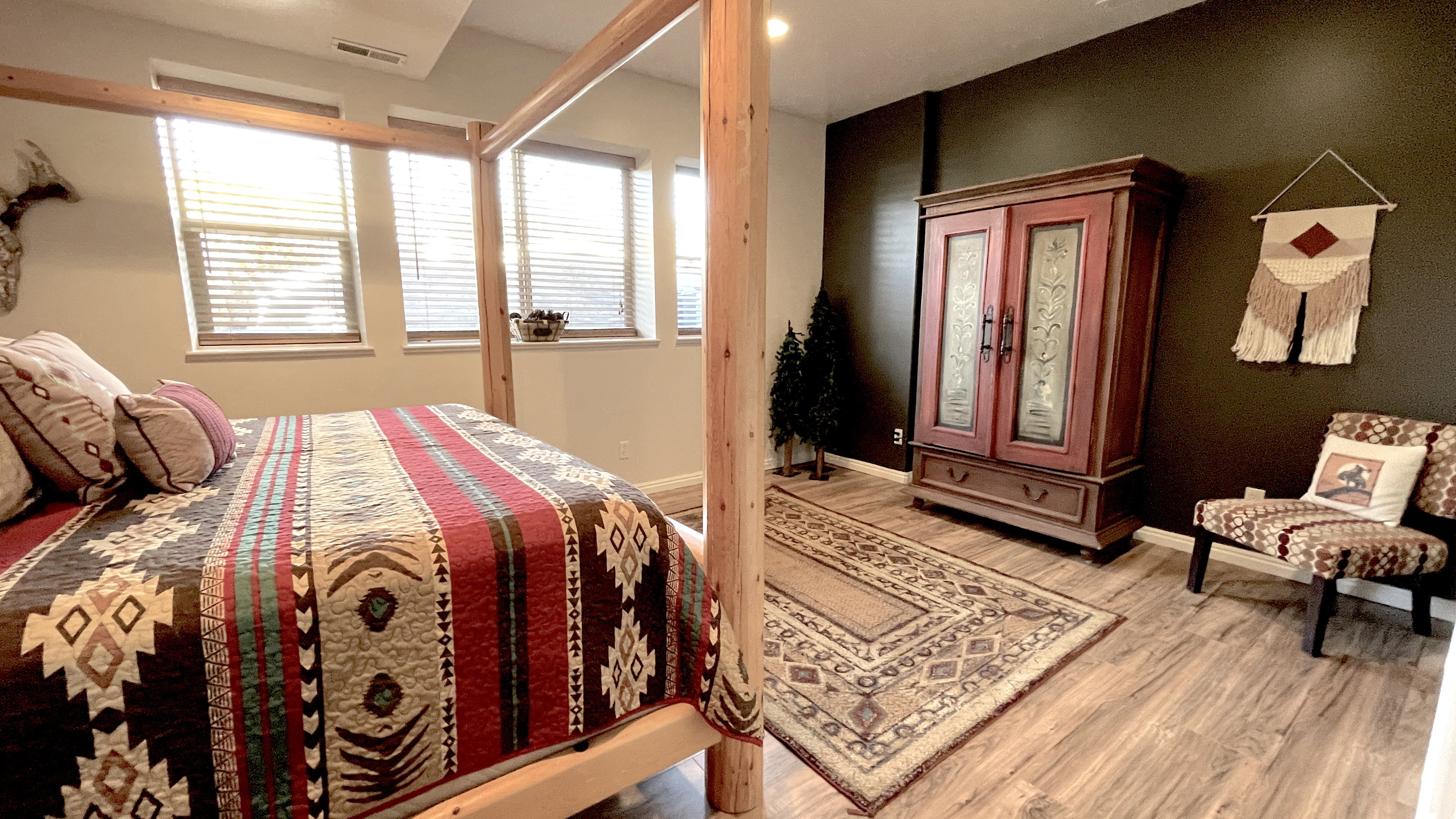 Primary suite featuring light wood-style floors