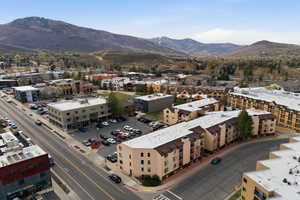 Aerial view of property's location featuring mountains