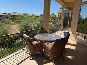 Balcony featuring outdoor dining space